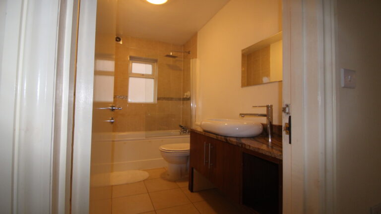 Queens-Road-Feltham-London-bath-shower-room.jpg